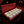 Load image into Gallery viewer, $250K Capacity RED WINE Brick w/AirTag
